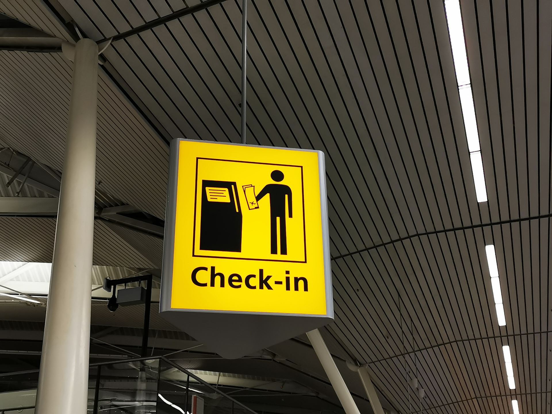 An airport check-in sign